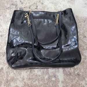Shiny Black MK Logo Purse Made by Michael Kors with gold accents